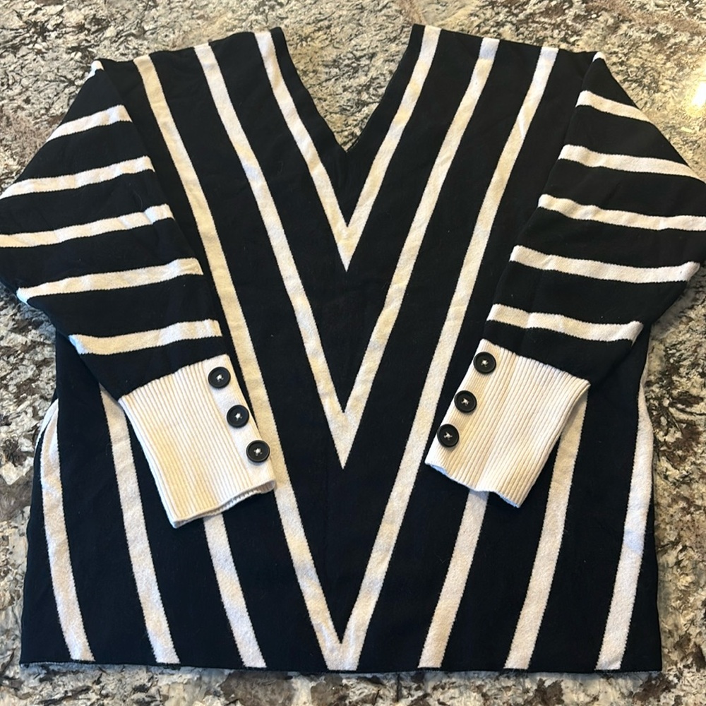 Amazon sweater, size women’s medium.